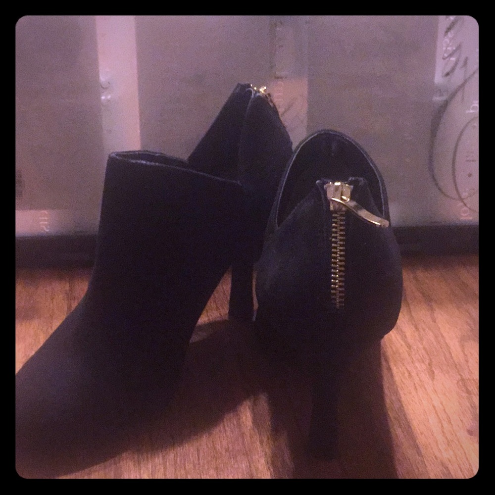 Black Ankle boots with gold zippers